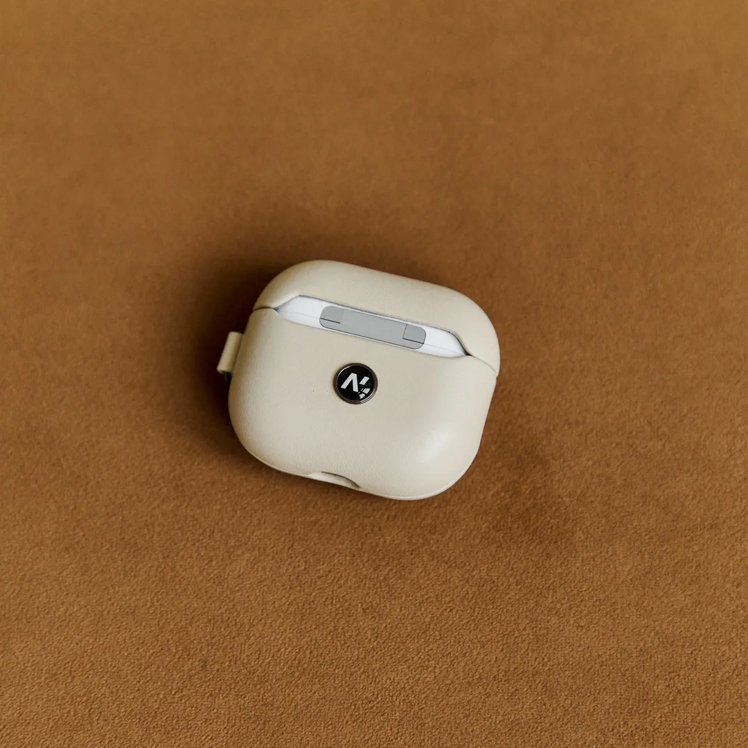 funda airpods beige